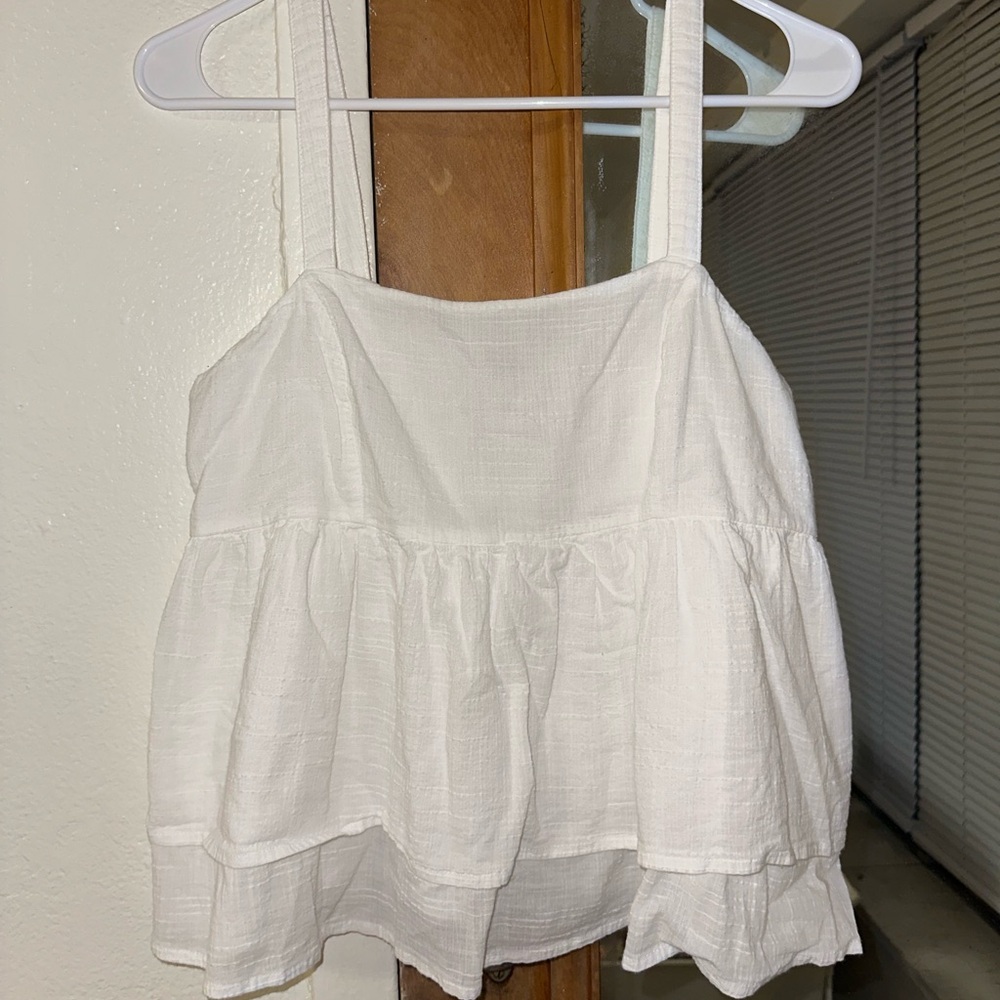 white ruffle boutique top